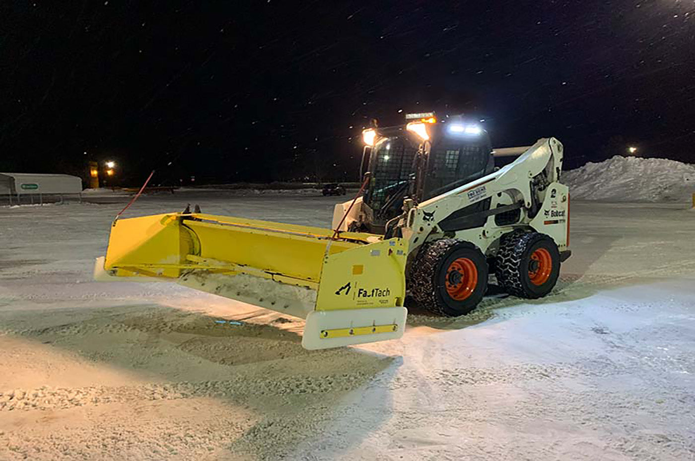 An image of a snowplow with additional plastic that is the same material used to create C&A Pro skis