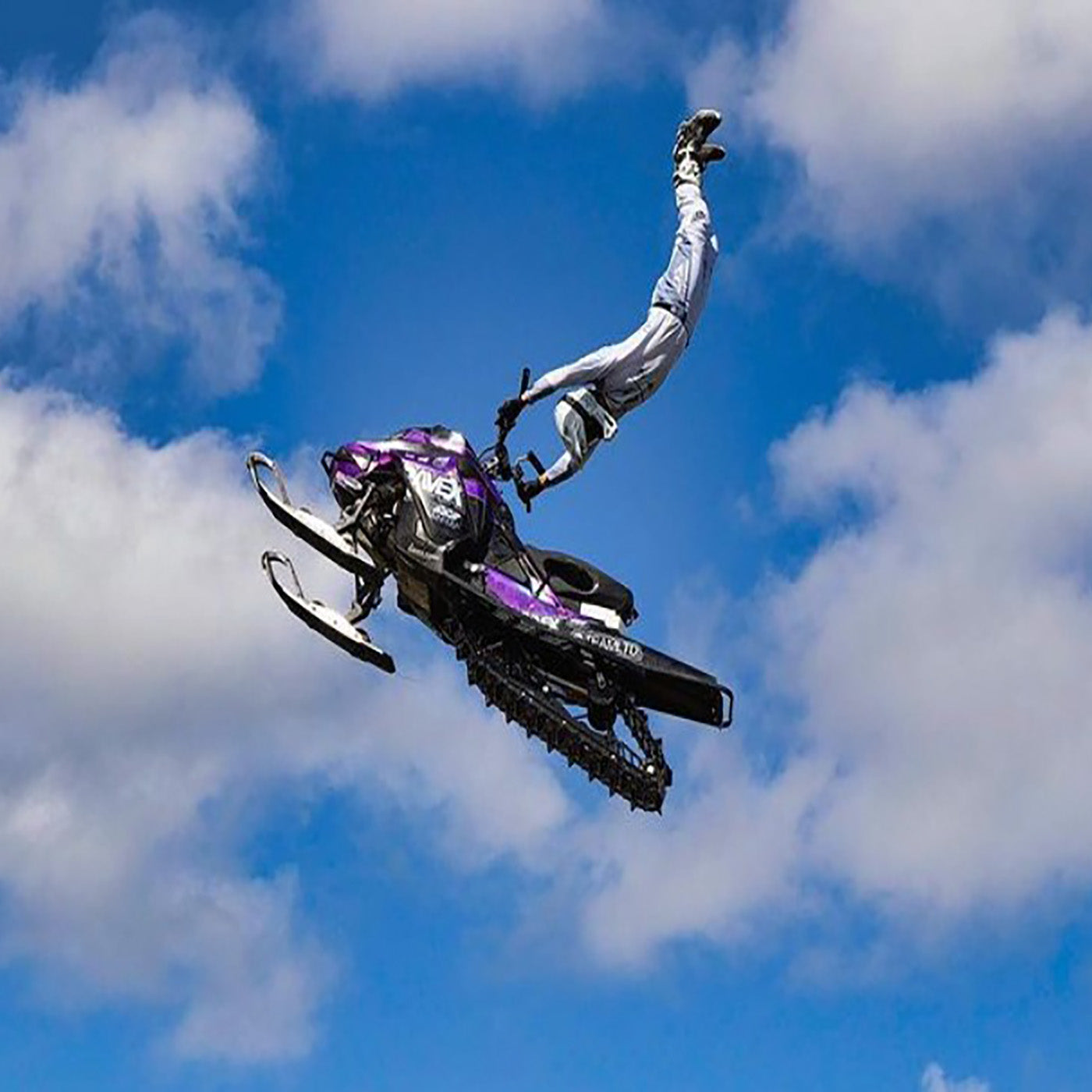 Chris Coosemans midair with all-white C&A Pro skis