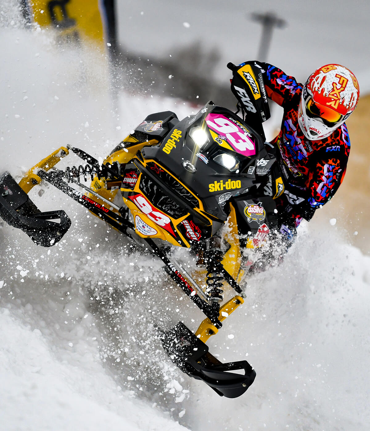 Pro Women's Snocross racer Malene Cottew on Ski-Doo snowmobile with black C&A Pro XT Snocross skis and black C&A Pro Cornering Kits