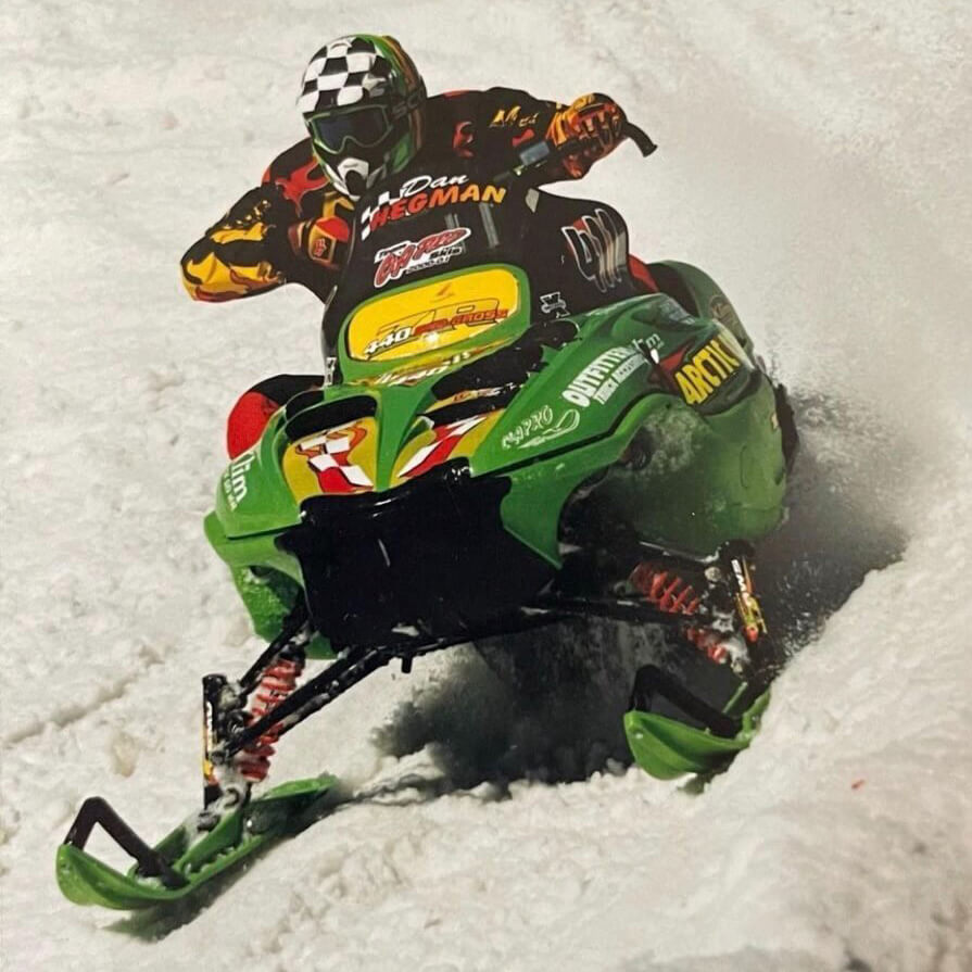 Snocross racer Dan Hegman riding Arctic Cat racing snowmobile with C&A Pro XT Skis.
