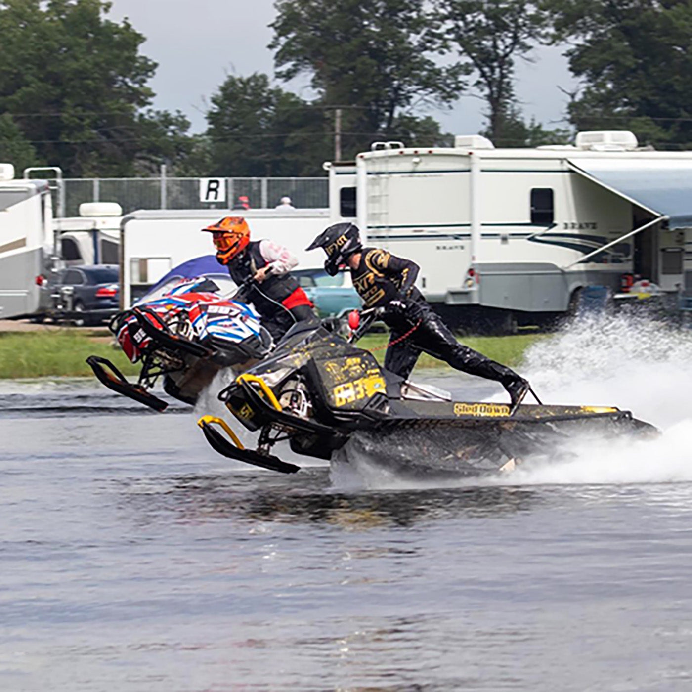Watercross racer Bradley Barrette racing with black C&A Pro skis with yellow handles