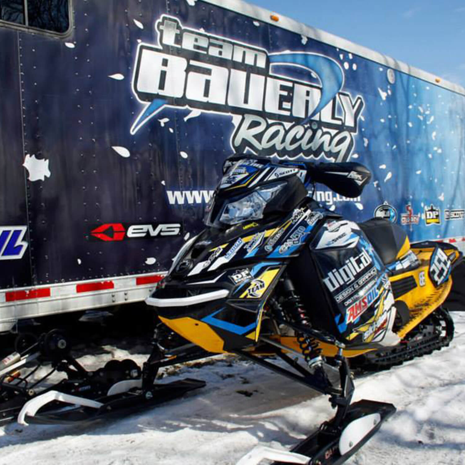 Team Bauerly Racing snowmobile race trailer with snowmobile race sled with black C&A Pro XT skis with white handles
