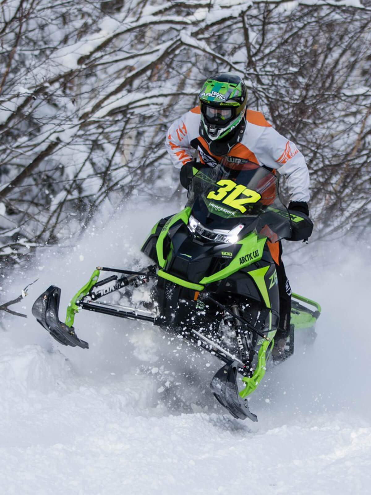 Professional cross country racer Zach Herfindahl on Arctic Cat snowmobile with C&A Pro black XCS skis