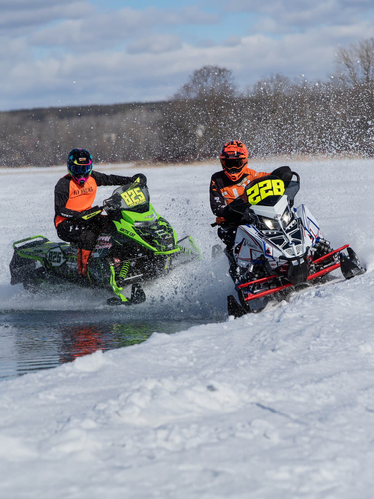 Two cross country snowmobile racers from Cor Powersports with C&A Pro skis