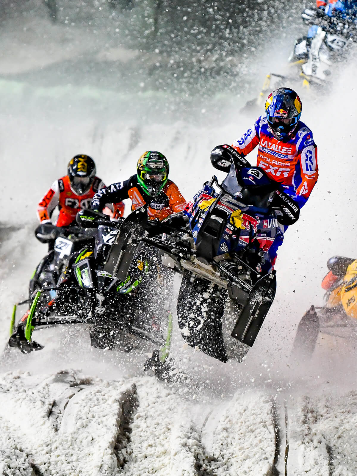 Group of pro Snocross racers at Amsoil ISOC Snocross race