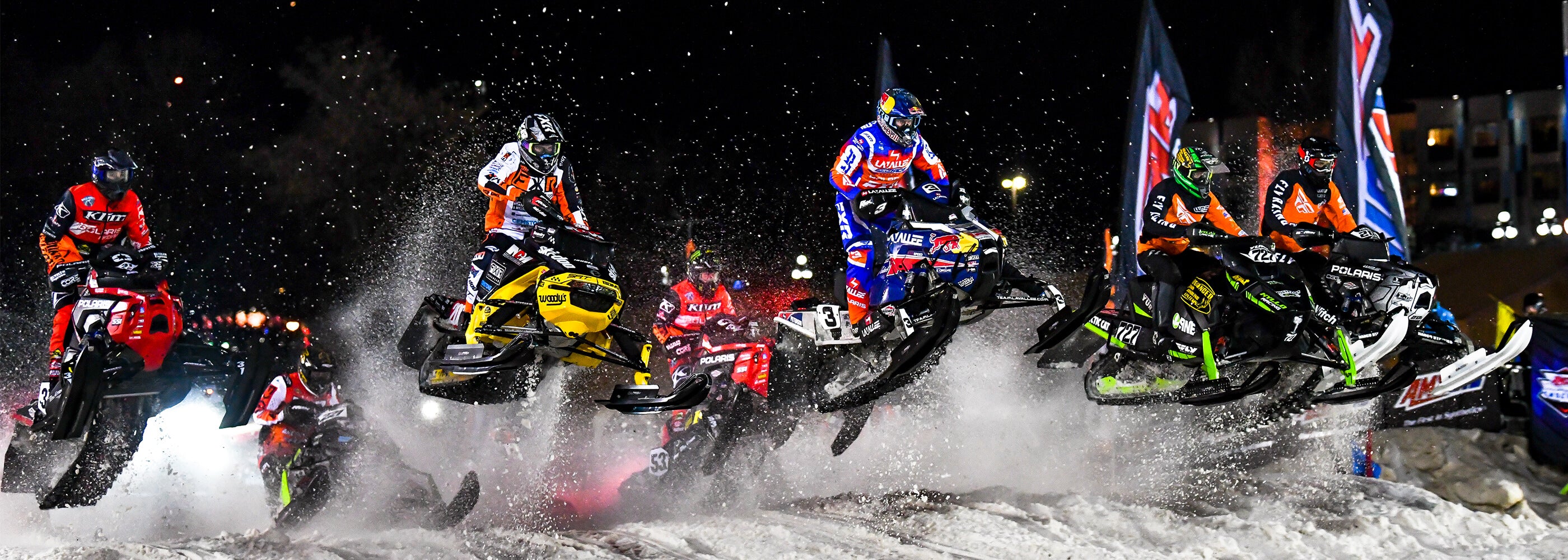 Group of pro Snocross racers at Amsoil ISOC Snocross race