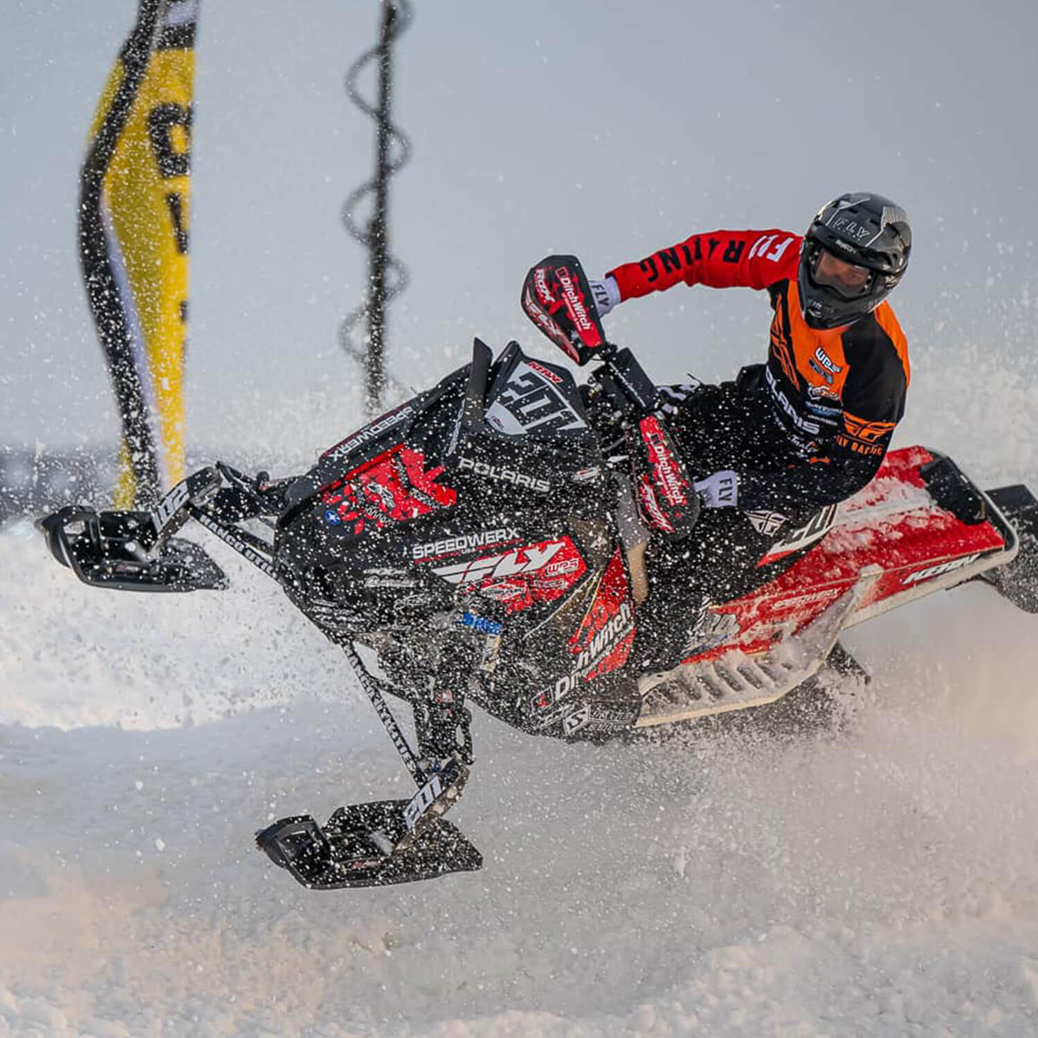 Snocross racer Travis Kern racing snowmobile for Cottew Motorsports with C&A Pro XT skis