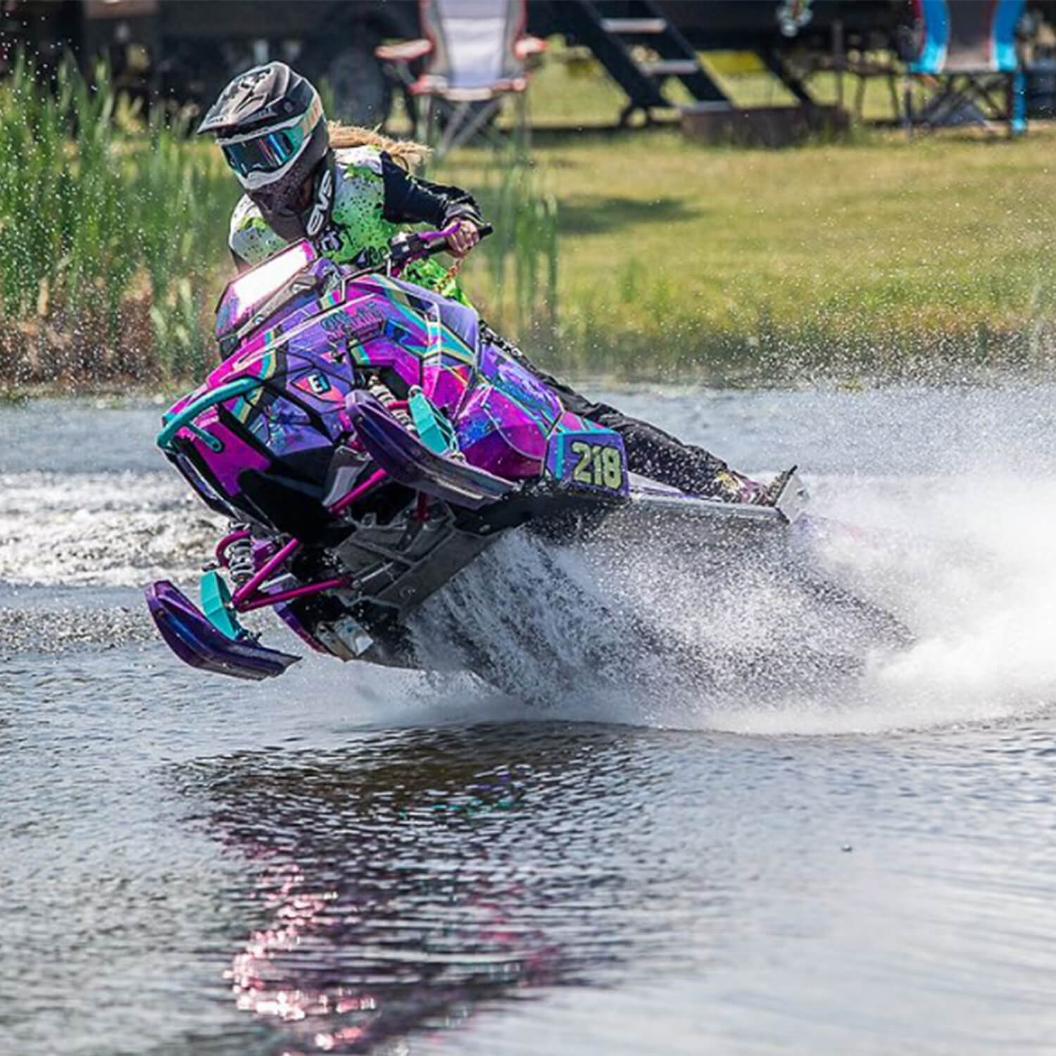 Erika Whitaker watercross racer, racing snowmobile on the water with C&A Pro purple Mini skis
