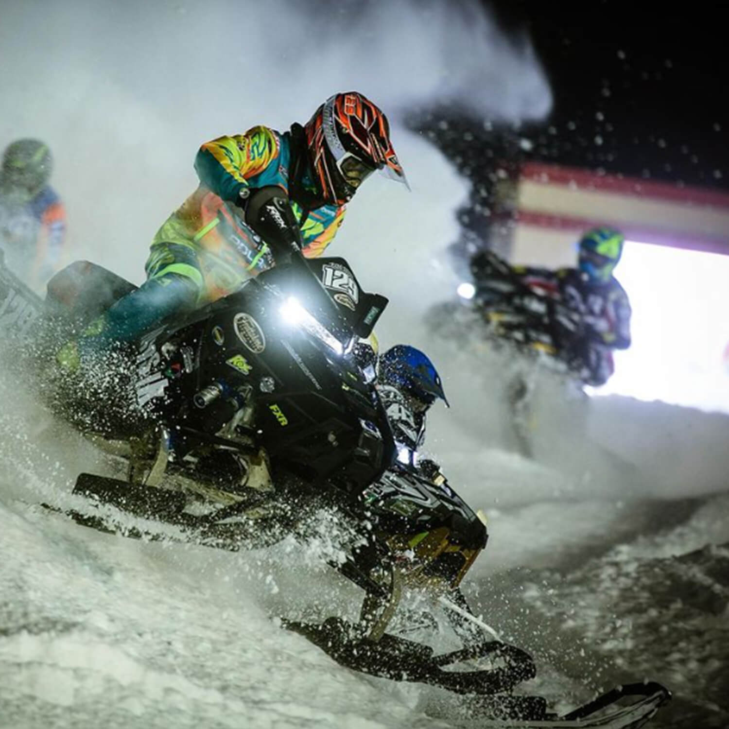 Snocross racer Eric Downs racing for Frattalone Racing on snowmobile with black C&A Pro XT skis with black cornering kits